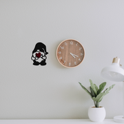 gnome heart metal wall art next to a clock badger steel usa